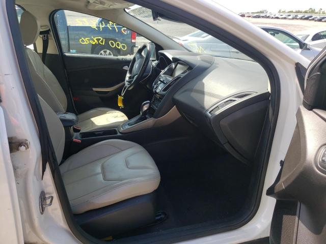 Photo 5 from auction – 2015 FORD FOCUS TITA with VIN 1FADP3J20FL322567