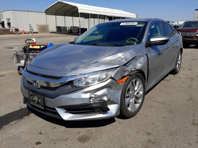Photo 2 from auction – 2018 HONDA CIVIC LX with VIN 2HGFC2F54JH544645