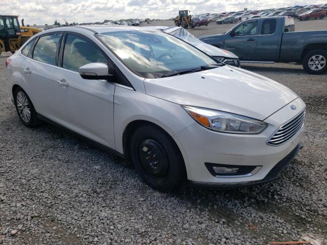 FORD FOCUS TITA 2015 with VIN 1FADP3J20FL322567 - Photo from auction
