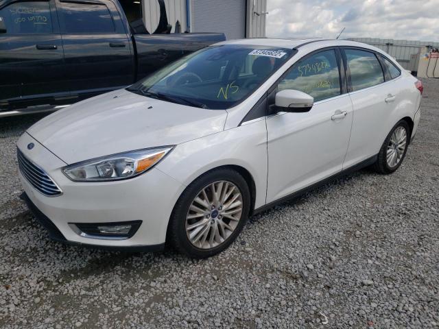 Photo 2 from auction – 2015 FORD FOCUS TITA with VIN 1FADP3J20FL322567