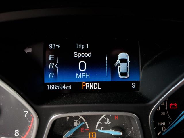Photo 8 from auction – 2015 FORD FOCUS with VIN 1FADP3F20FL305986
