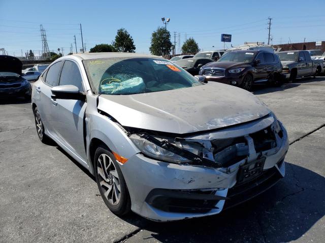 HONDA CIVIC EX 2018 with VIN 2HGFC2F70JH538827 - Photo from auction