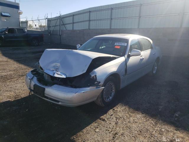 Photo 2 from auction – 2002 LINCOLN TOWN CAR C with VIN 1LNHM83W12Y656388