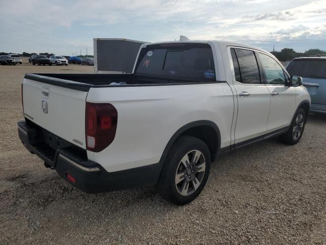 Photo 4 from auction – 2019 HONDA RIDGELINE with VIN 5FPYK3F75KB020324
