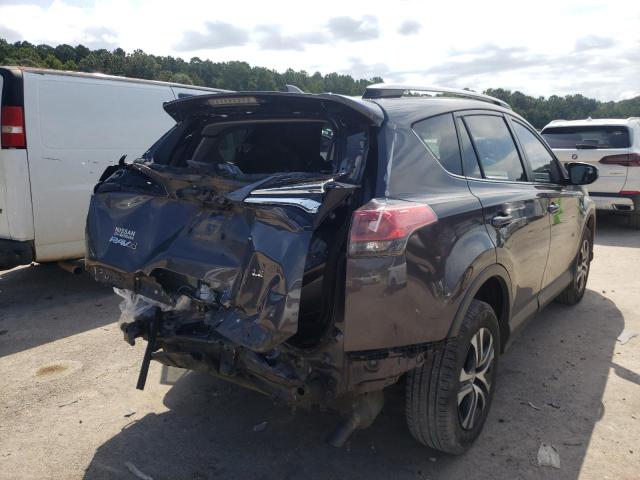 Photo 4 from auction – 2017 TOYOTA RAV4 LE with VIN JTMZFREV6HJ701016