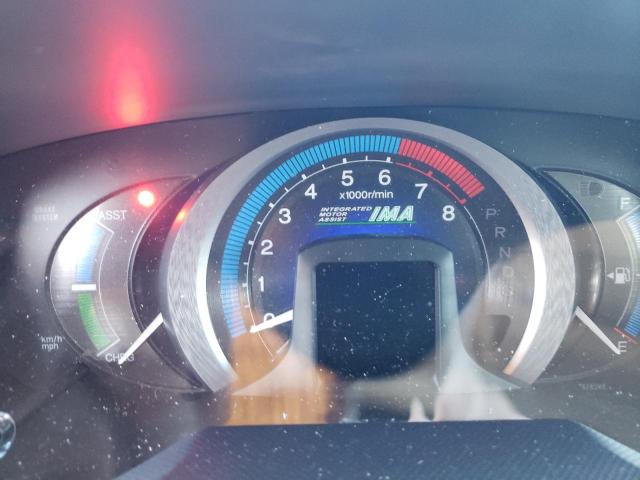 Photo 8 from auction – 2010 HONDA INSIGHT EX with VIN JHMZE2H73AS036694