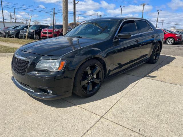 Photo 2 from auction – 2014 CHRYSLER 300 SRT-8 with VIN 2C3CCAFJ2EH119735