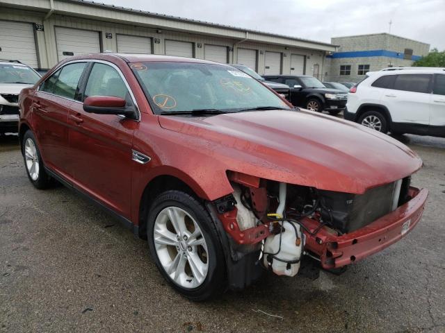FORD TAURUS SEL 2014 with VIN 1FAHP2E81EG129099 - Photo from auction