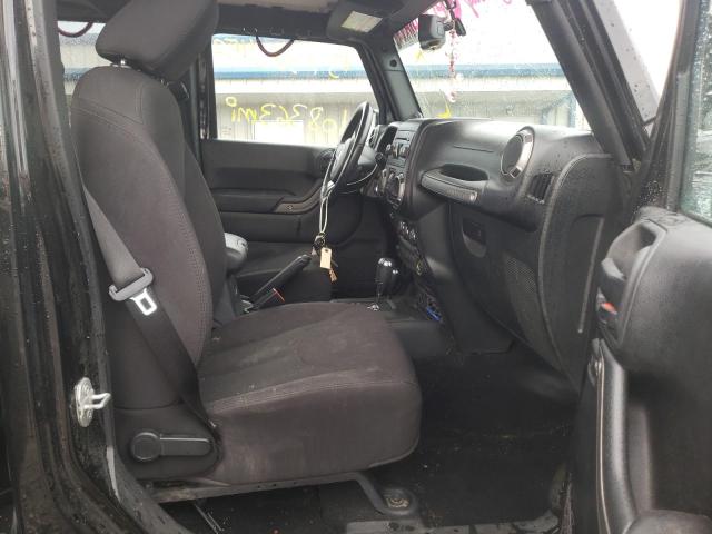 Photo 5 from auction – 2014 JEEP WRANGLER U with VIN 1C4BJWDG2EL319793
