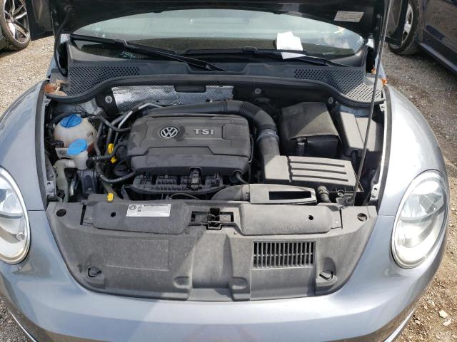 Photo 7 from auction – 2014 VOLKSWAGEN BEETLE with VIN 3VWJ17AT4EM662104
