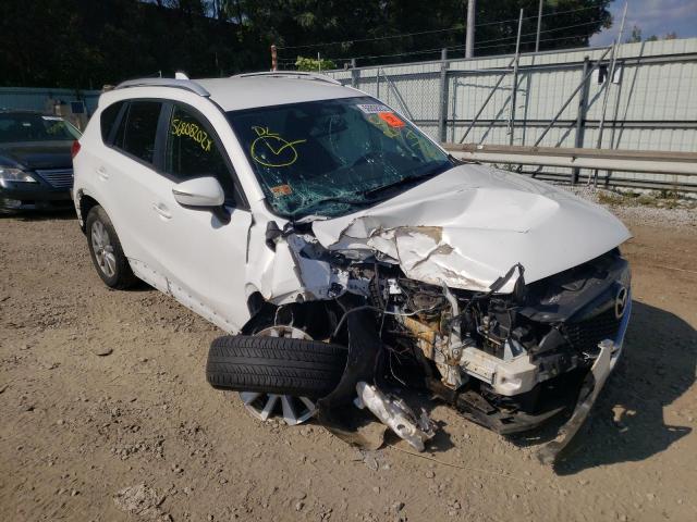 MAZDA CX-5 TOURI 2015 with VIN JM3KE2CY2F0517596 - Photo from auction