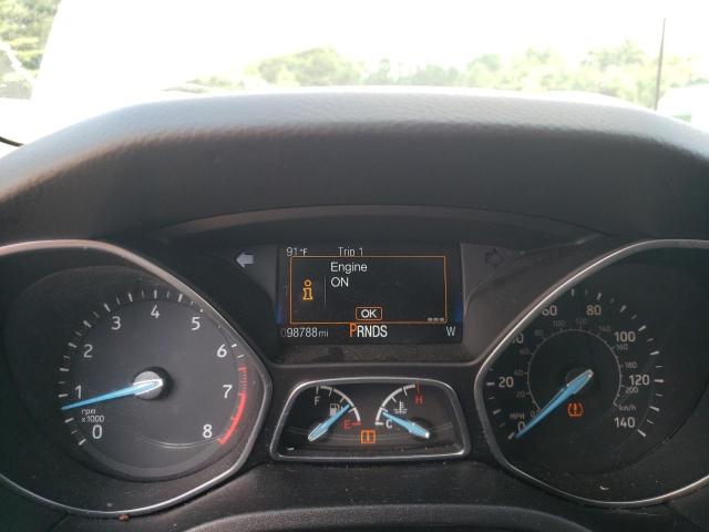 Photo 8 from auction – 2015 FORD FOCUS TITA with VIN 1FADP3J24FL310504