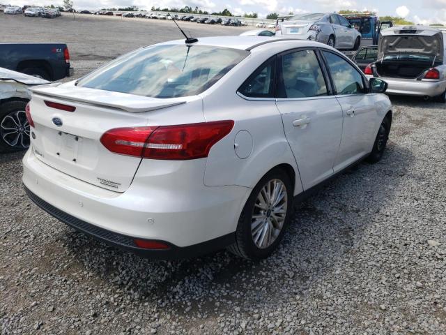 Photo 4 from auction – 2015 FORD FOCUS TITA with VIN 1FADP3J20FL322567