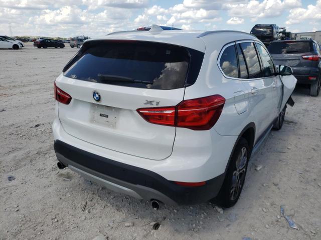 Photo 4 from auction – 2017 BMW X1 XDRIVE2 with VIN WBXHT3C38H5F85559