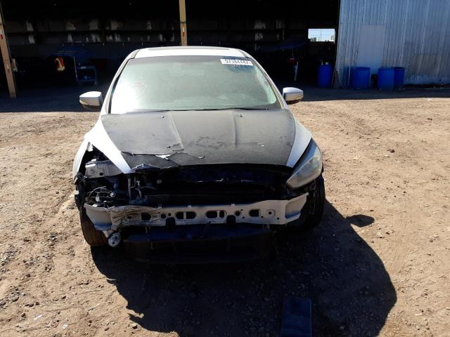 Photo 9 from auction – 2016 FORD FOCUS SE with VIN 1FADP3K20GL213946