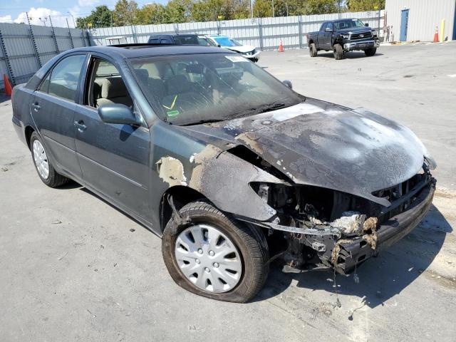 TOYOTA CAMRY LE 2002 with VIN 4T1BE30K82U586757 - Photo from auction