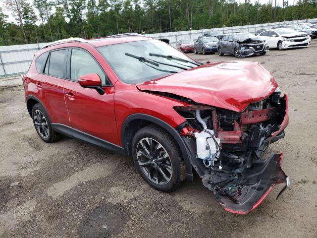 MAZDA CX-5 GT 2016 with VIN JM3KE2DY0G0857118 - Photo from auction