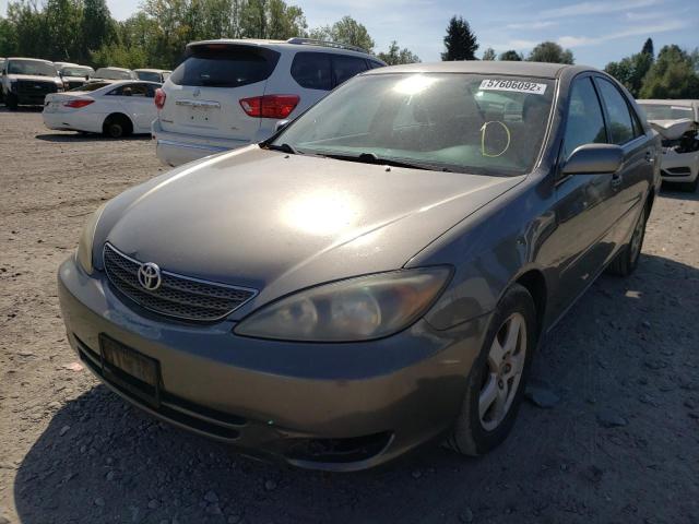Photo 2 from auction – 2003 TOYOTA CAMRY LE with VIN JTDBE32K530170689