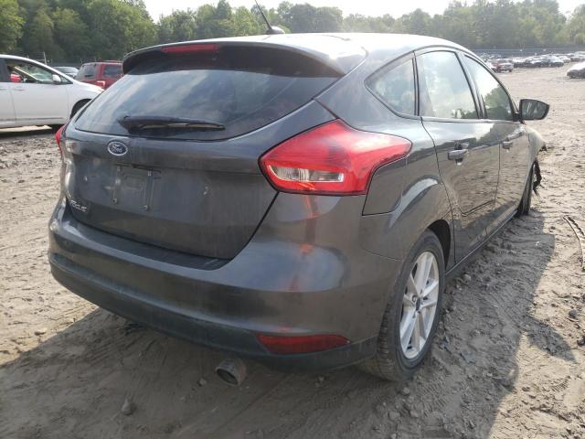 Photo 4 from auction – 2018 FORD FOCUS SE with VIN 1FADP3K23JL209381