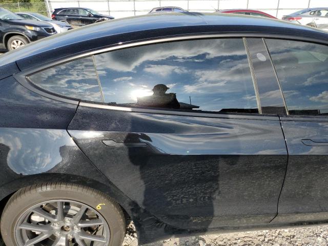 Photo 6 from auction – 2021 TESLA MODEL 3 with VIN 5YJ3E1EBXMF012825