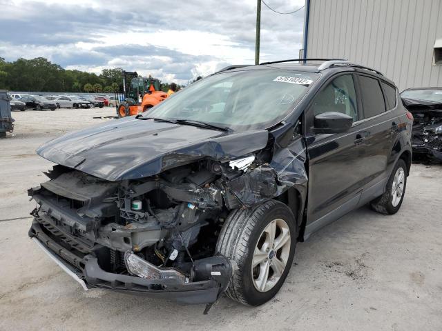 Photo 2 from auction – 2014 FORD ESCAPE SE with VIN 1FMCU0G95EUD49026