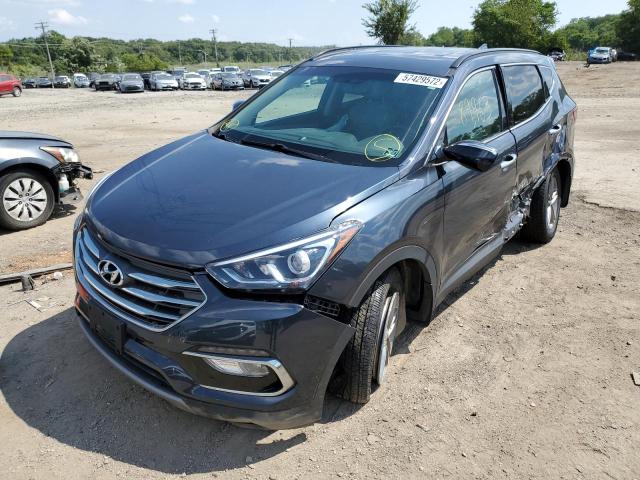 Photo 2 from auction – 2017 HYUNDAI SANTA FE S with VIN 5NMZU3LB9HH008877
