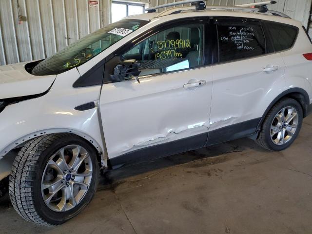 Photo 9 from auction – 2014 FORD ESCAPE TIT with VIN 1FMCU9J90EUD60030