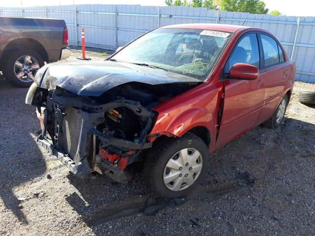 Photo 2 from auction – 2011 KIA RIO BASE with VIN KNADH4A35B6930662