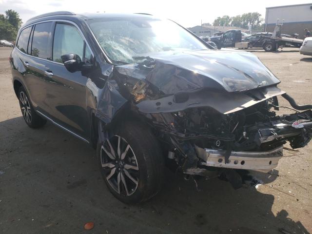 HONDA PILOT TOUR 2020 with VIN 5FNYF6H97LB025121 - Photo from auction