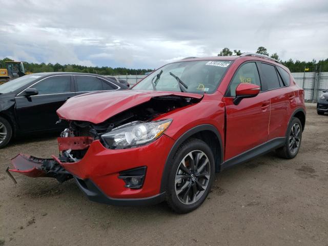 Photo 2 from auction – 2016 MAZDA CX-5 GT with VIN JM3KE2DY0G0857118