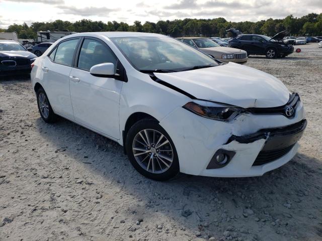 TOYOTA COROLLA L 2015 with VIN 2T1BURHEXFC289890 - Photo from auction