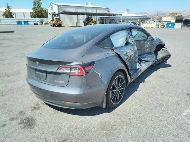 Photo 4 from auction – 2021 TESLA MODEL 3 with VIN 5YJ3E1EC2MF037730
