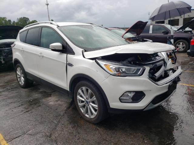 FORD ESCAPE TIT 2017 with VIN 1FMCU0JD9HUD10599 - Photo from auction