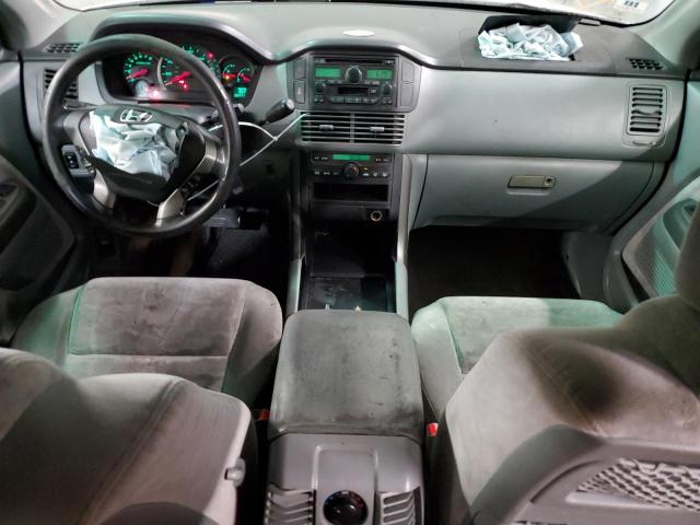 Photo 9 from auction – 2004 HONDA PILOT EX with VIN 2HKYF18494H554368