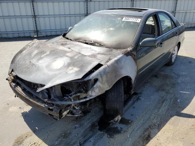 Photo 2 from auction – 2002 TOYOTA CAMRY LE with VIN 4T1BE30K82U586757