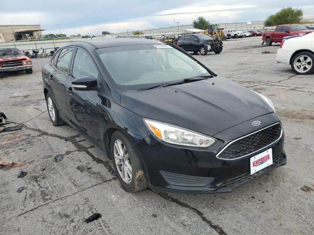 FORD FOCUS SE 2017 with VIN 1FADP3F21HL247051 - Photo from auction