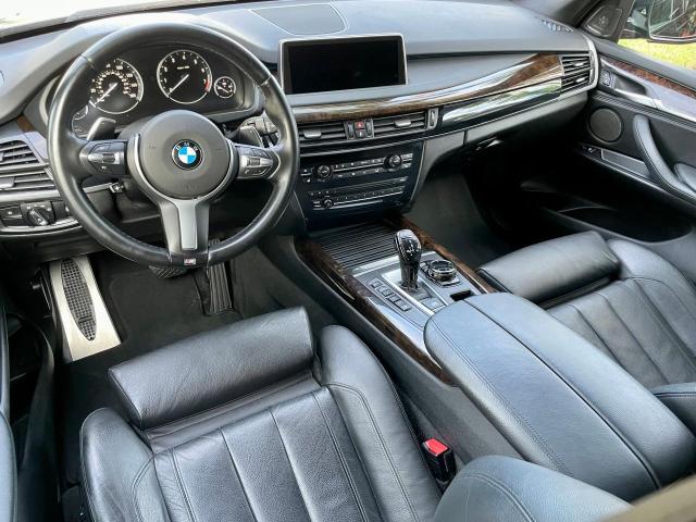 Photo 9 from auction – 2014 BMW X5 XDRIVE5 with VIN 5UXKR6C56E0J72757