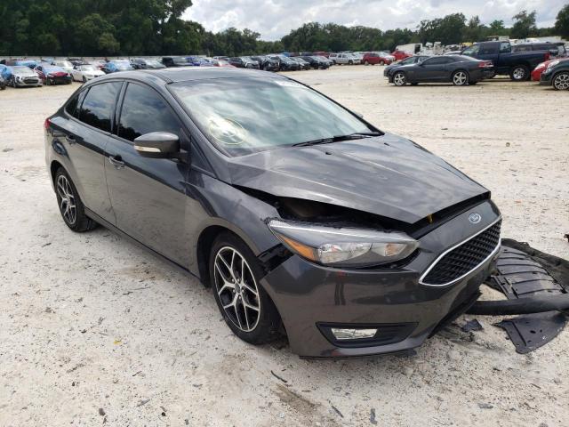 FORD FOCUS SEL 2018 with VIN 1FADP3H29JL319617 - Photo from auction