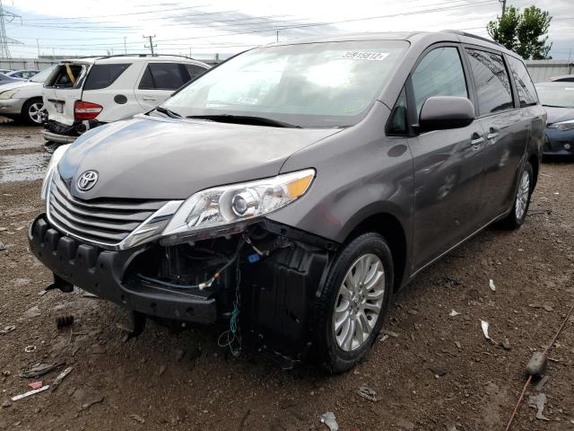 Photo 2 from auction – 2014 TOYOTA SIENNA XLE with VIN 5TDYK3DC3ES434548
