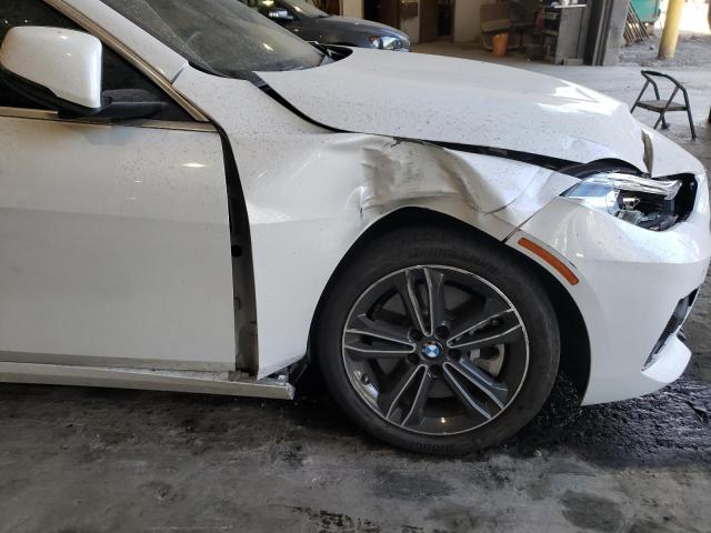 Photo 9 from auction – 2022 BMW 228XI with VIN WBA73AK08N7K14741