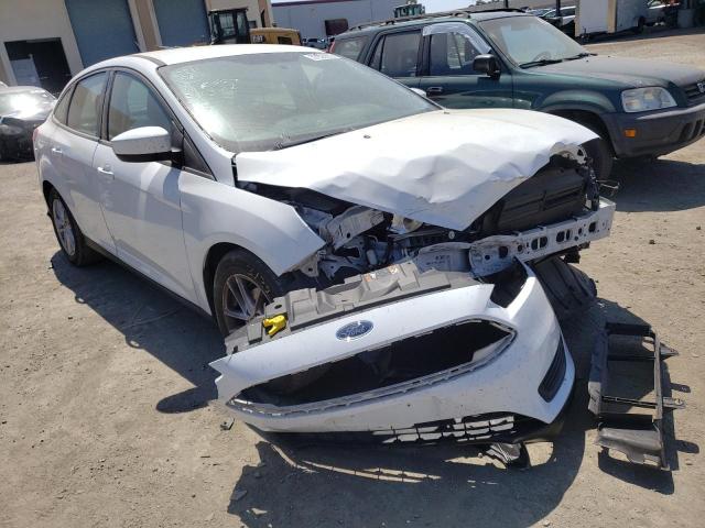 FORD FOCUS SE 2018 with VIN 1FADP3F22JL262146 - Photo from auction