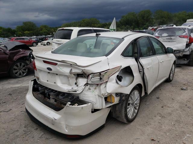Photo 4 from auction – 2015 FORD FOCUS TITA with VIN 1FADP3J26FL229942