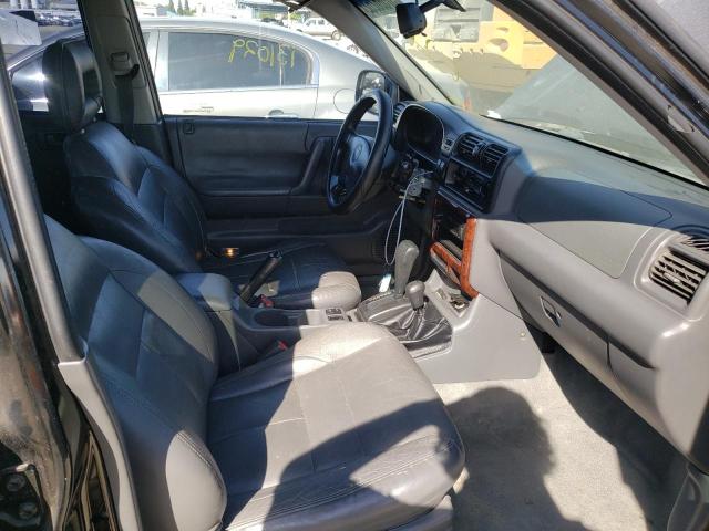 Photo 5 from auction – 1999 HONDA PASSPORT E with VIN 4S6CM58W6X4408533