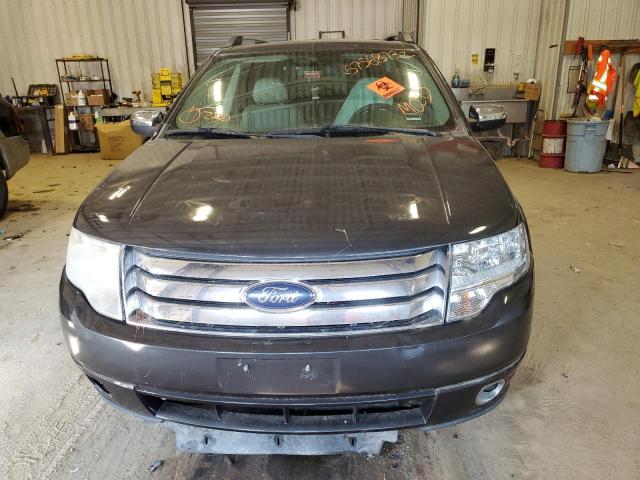 Photo 9 from auction – 2008 FORD TAURUS X L with VIN 1FMDK06W68GA01031