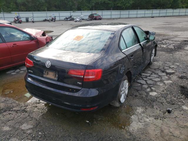 Photo 4 from auction – 2017 VOLKSWAGEN JETTA S with VIN 3VW2B7AJ5HM204026