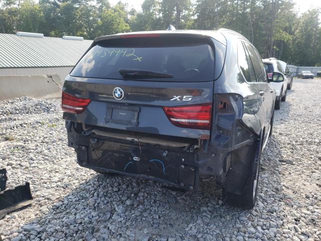 Photo 9 from auction – 2014 BMW X5 XDRIVE3 with VIN 5UXKR0C54E0K47470
