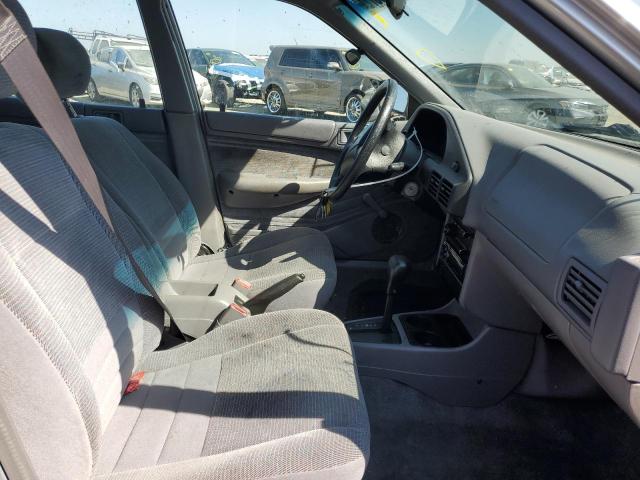 Photo 5 from auction – 1995 FORD ESCORT with VIN 3FASP13J2SR114461