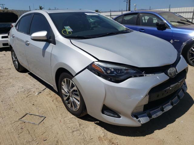 TOYOTA COROLLA L 2017 with VIN 5YFBURHEXHP602911 - Photo from auction