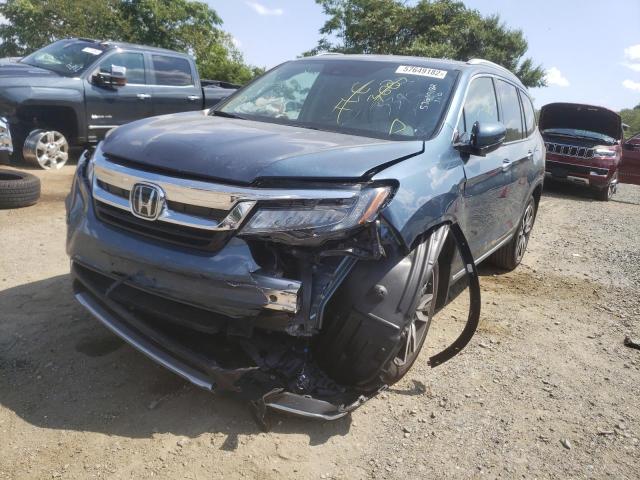 Photo 9 from auction – 2021 HONDA PILOT TOUR with VIN 5FNYF6H65MB055371