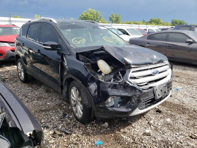 FORD ESCAPE TIT 2017 with VIN 1FMCU9JD7HUC64596 - Photo from auction
